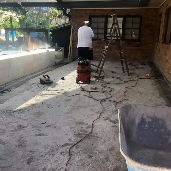 Foundation waterproofing remediation on sandstone building