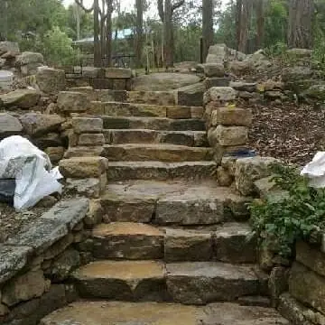Natural sandstone steps through bushland garden setting