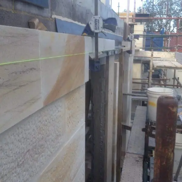 Harbour sandstone wall with dressed block finish
