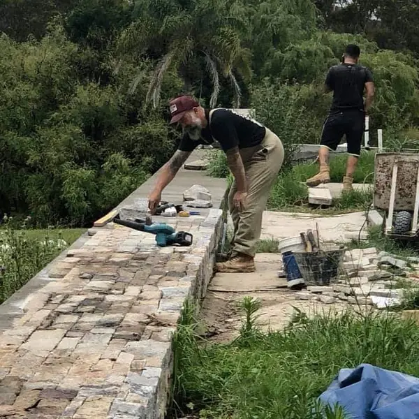 Garden path with sandstone edging and green surrounds