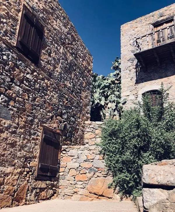 Historic stone village buildings with rustic masonry walls