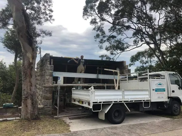 Romans Building Services truck at heritage stone site