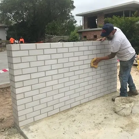 Bricklaying in progress on residential building site