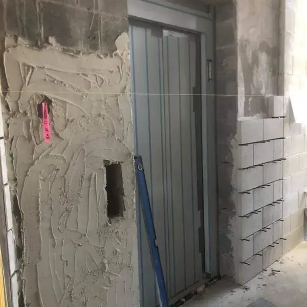 Block wall lift shaft enclosure on commercial site