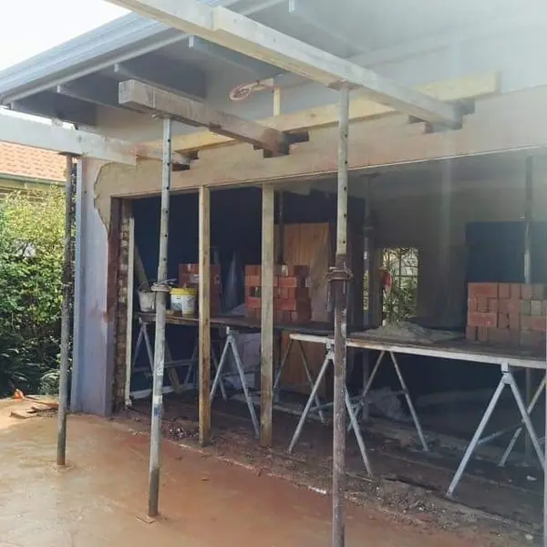 Temporary structural supports on building renovation site