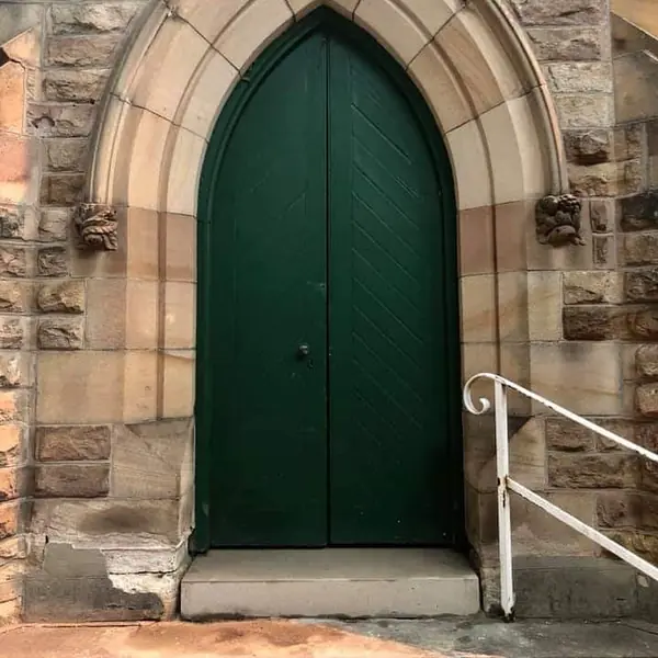 Damaged stone step at heritage building entrance