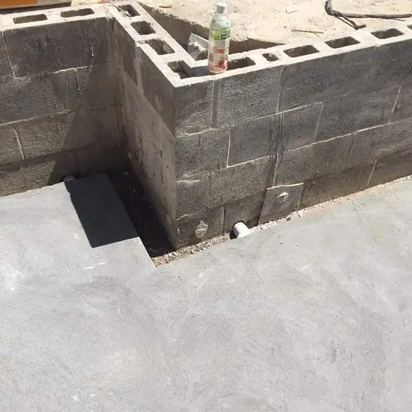 Pool area concrete work and wall rendering in progress