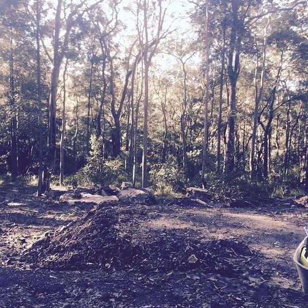 Site clearing and preparation for new retaining wall