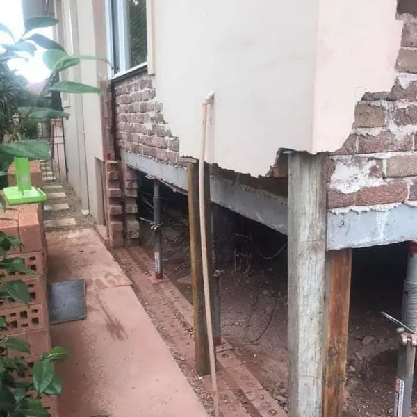 Subfloor foundation repair with exposed brickwork