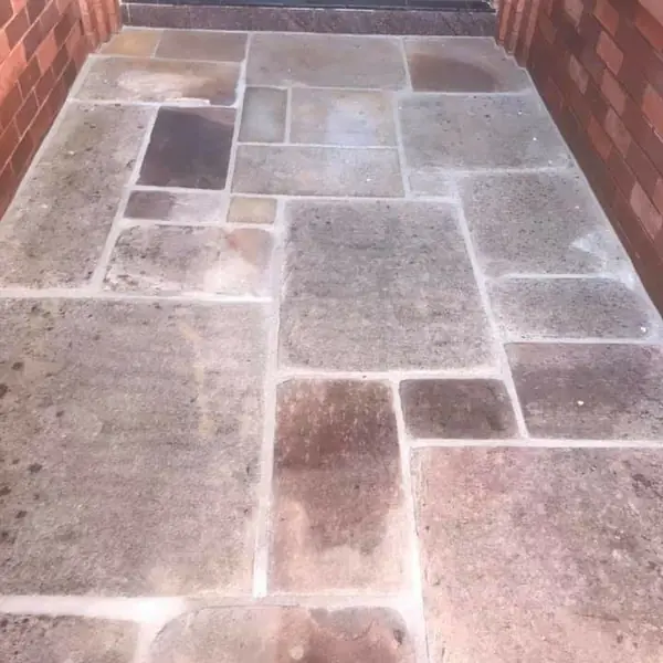 Sandstone paving pathway with irregular natural edges