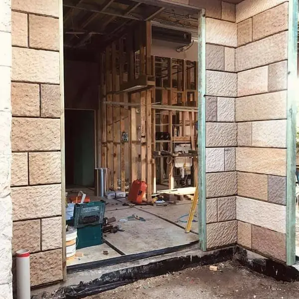 Sandstone block construction on new residential building