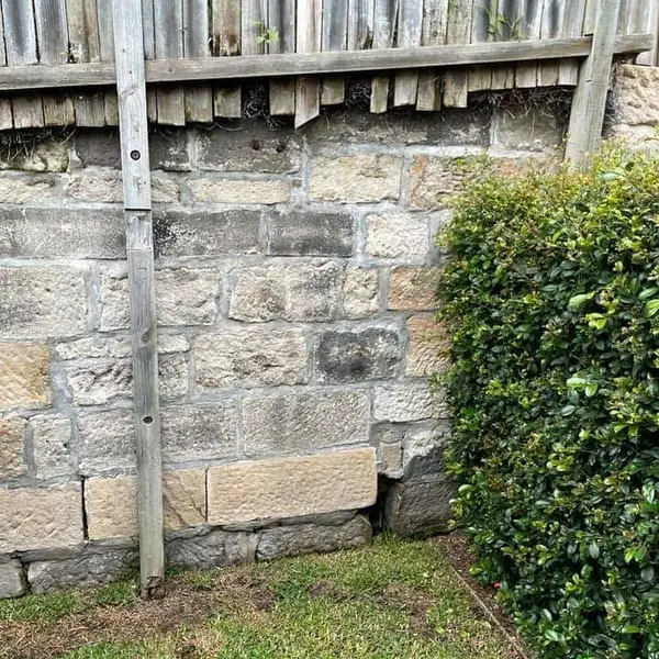 Sandstone seawall block wall nearing completion