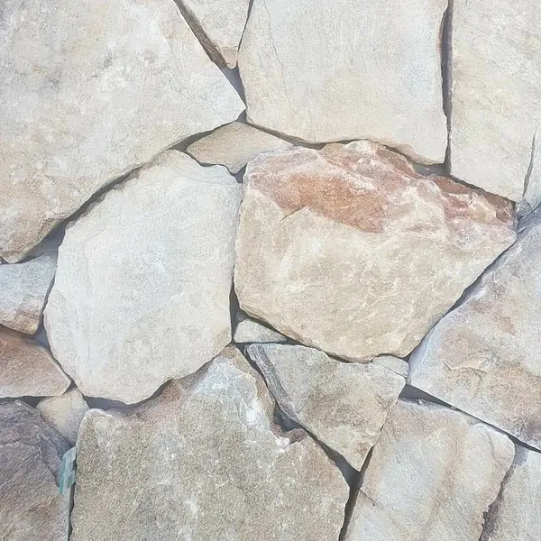 Sandstone crazy paving wall texture close-up