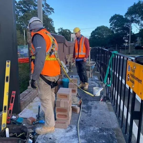 Brick parapet repair on elevated railway structure