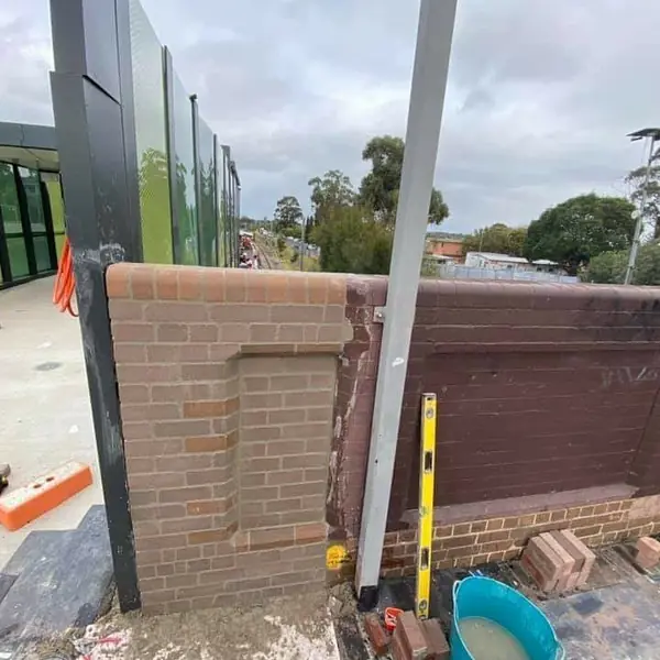 Completed brick parapet on railway infrastructure