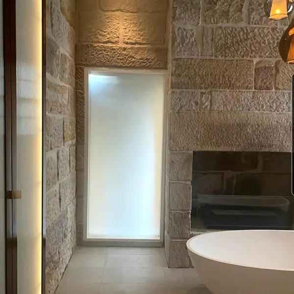 Premium sandstone bathroom feature wall detail
