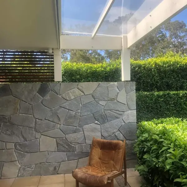 Completed blue stone crazy paving feature wall on verandah