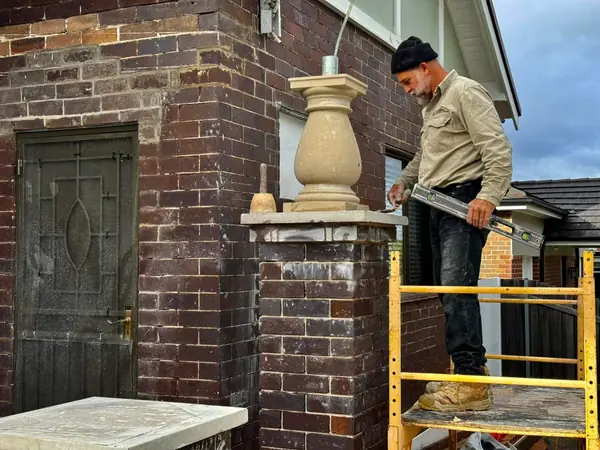 Brick residential construction with scaffolding on-site