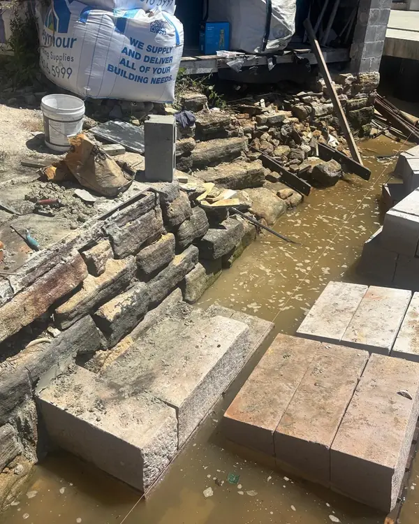 Sandstone seawall formwork in tidal harbour zone